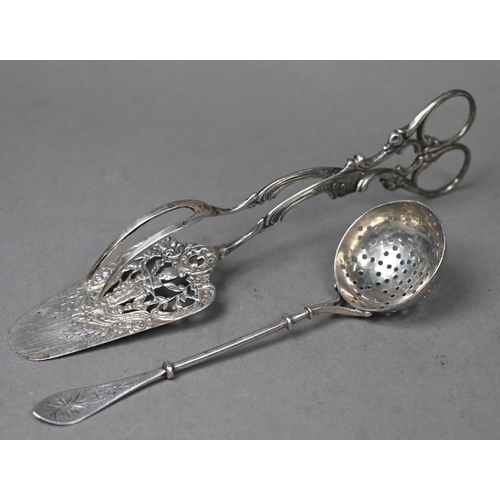 85 - A Sterling 1904 St Louis (Miss.) World's Fair commemorative spoon, a pair of French .950 grade pastr... 