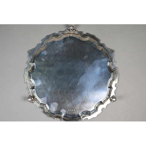 88 - A silver letter salver with cast and moulded rim, three scroll feet, J B Chatterley & Sons Ltd, ... 