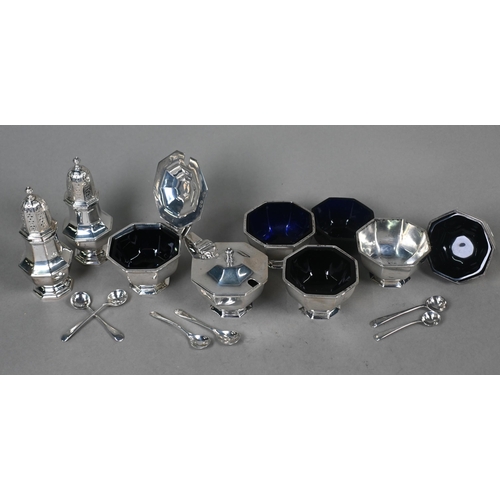 89 - A heavy quality silver condiment set of octagonal form, with six associated silver spoons, Garrard &... 