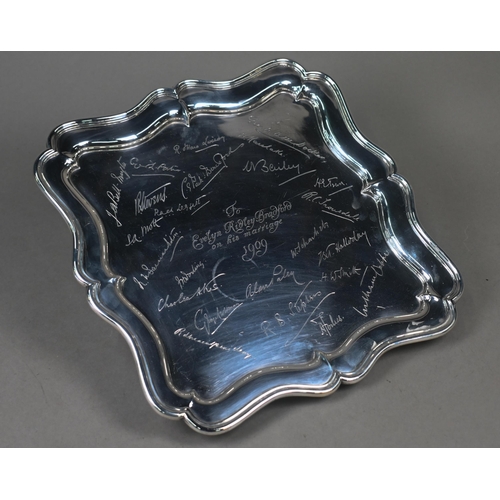 92 - Cricketing interest: an Edwardian silver square salver, engraved with 1909 presentation inscription ... 