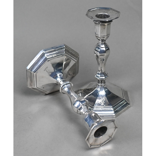 93 - A pair of late Victorian loaded silver candlesticks of octagonal baluster form with detachable greas... 