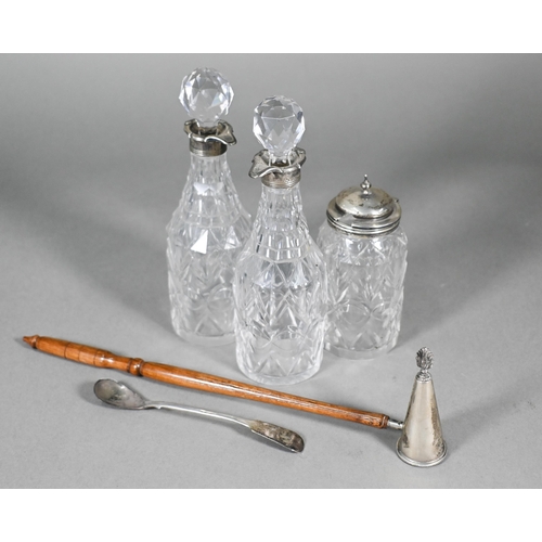 98 - Three Victorian cut glass condiment bottles with silver mounts, to/w a conical candle snuffer on tur... 