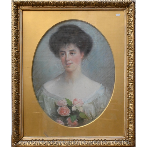 530 - L G Hughes - Portrait of a young lady with a posy of roses, pastel, signed, 58 x 44 cm (oval)