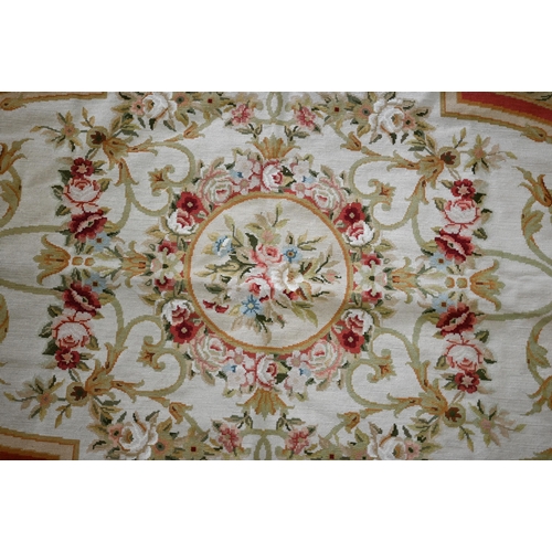 619 - A small Aubusson floral rug design rug, on camel ground, 149 cm x 89 cm