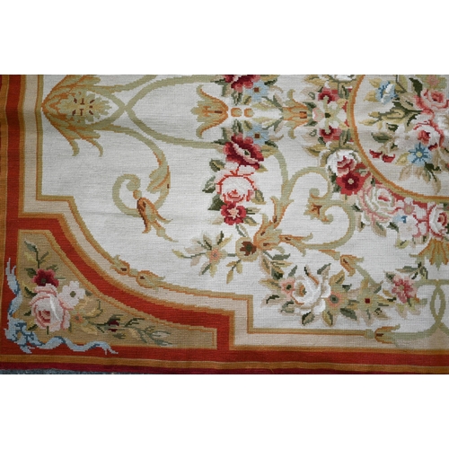 619 - A small Aubusson floral rug design rug, on camel ground, 149 cm x 89 cm