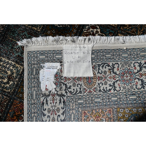 633 - An old Persian Baktiari garden tile design rug in multi-coloured silks, 185 cm x 121 cm