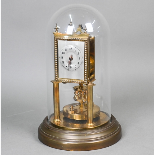 639 - Gustav Becker, a brass torsion movement mantel clock, the brass frame with Roman numeral engraved si... 