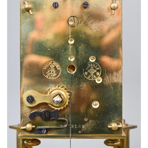 639 - Gustav Becker, a brass torsion movement mantel clock, the brass frame with Roman numeral engraved si... 