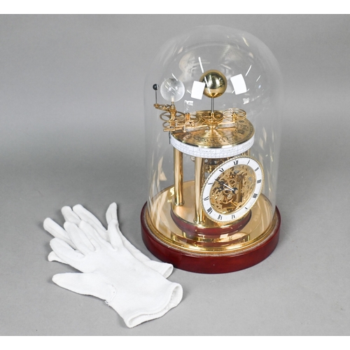 646 - An Astrolabium 2000 Millenium clock by Hermle, Germany, under glass dome, the white enamelled dial w... 