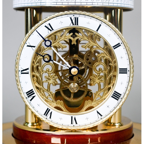 646 - An Astrolabium 2000 Millenium clock by Hermle, Germany, under glass dome, the white enamelled dial w... 