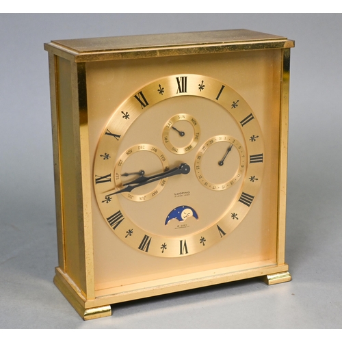 647 - A Swiss antimagnetic 8-day calendar alarm travel clock by Looping, the gilt-brass case with twin win... 