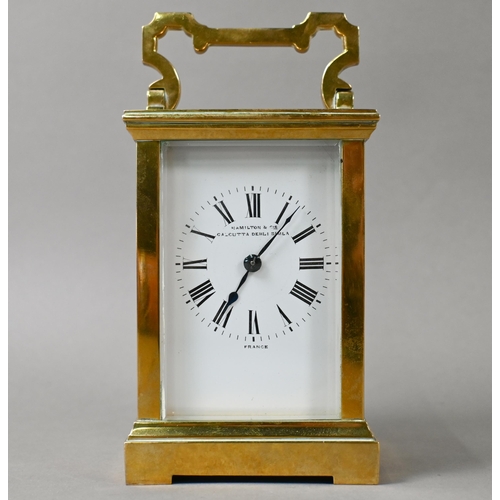 649 - A French lacquered brass 8-day carriage clock, the two train movement with white enamelled dial sign... 