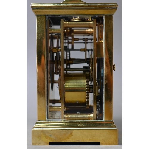 649 - A French lacquered brass 8-day carriage clock, the two train movement with white enamelled dial sign... 