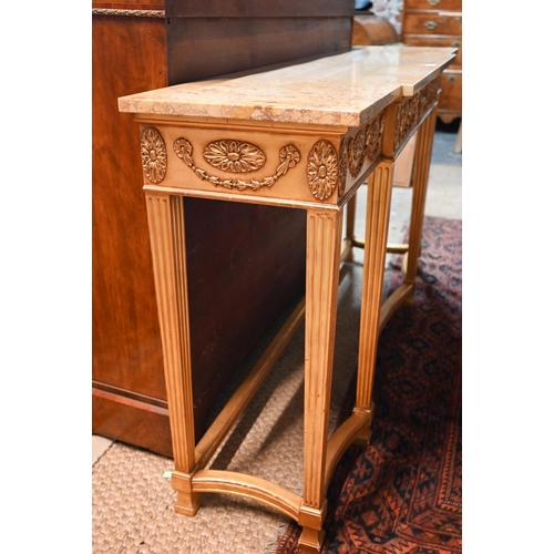 657 - An Adam style breakfront giltwood marble top console table, the frieze with floral swags in relief, ... 