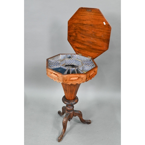 658 - A Victorian floral marquetry walnut work table, of octagonal form, the hinged top enclosing a paper ... 