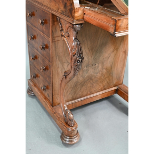 659 - A Victorian walnut piano top Davenport desk, the rise and fall stationary store over a hinged top en... 