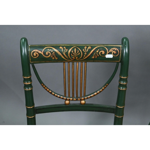 666 - A set of four Regency gilt and green painted faux bamboo salon side chairs, with caned seats (4)