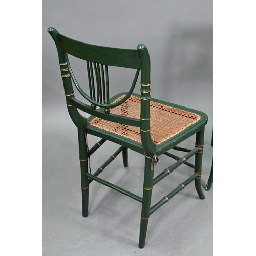 666 - A set of four Regency gilt and green painted faux bamboo salon side chairs, with caned seats (4)