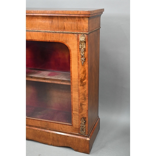 669 - A Victorian ormolu mounted crossbanded and boxwood inlaid walnut salon cabinet, the two arched glaze... 