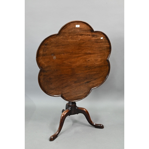 673 - A George III style tilt-top tripod tea table, 85 cm dia. x 72 cm h