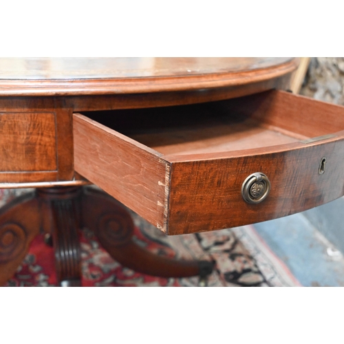 675 - A Victorian mahogany library drum table, the gilt tooled tan leather inset revolving top with four a... 