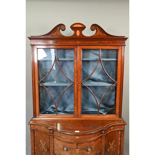 683 - AMENDED ESTIMATE A Victorian inlaid and crossbanded satinwood display cabinet in two parts, the uppe... 