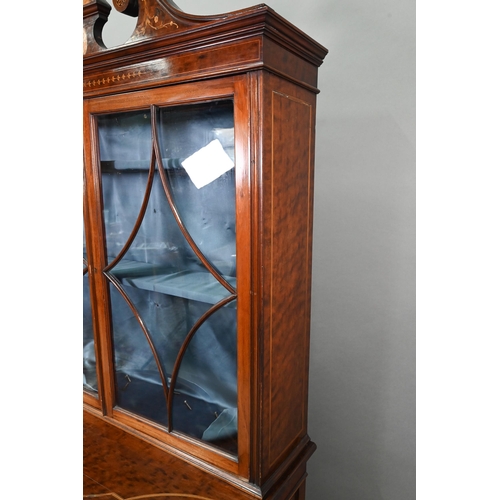 683 - AMENDED ESTIMATE A Victorian inlaid and crossbanded satinwood display cabinet in two parts, the uppe... 