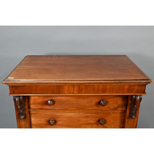 685 - An Edwardian mahogany seven drawer Wellington chest with turned wood handles, on a plinth base, 66 x... 