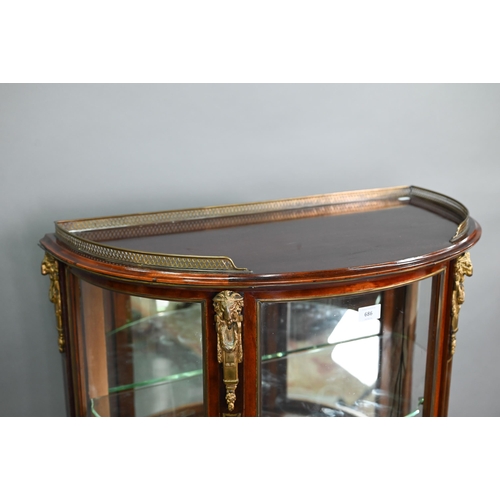 686 - A good late 19th century brass inlaid and mounted red walnut demi-lune salon vitrine cabinet, the pi... 