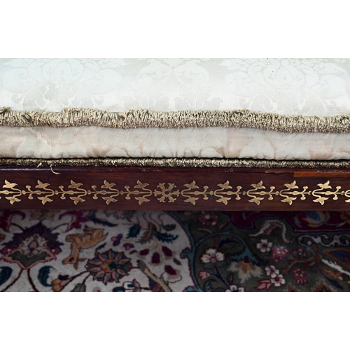 688 - A Regency profusely brass inlaid rosewood scroll end sofa, with pale green damask upholstery and rai... 