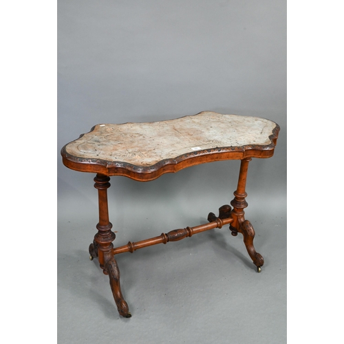 693 - A Victorian inlaid walnut centre table, the shaped and figured veneered top over turned and moulded ... 