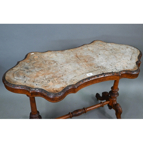 693 - A Victorian inlaid walnut centre table, the shaped and figured veneered top over turned and moulded ... 