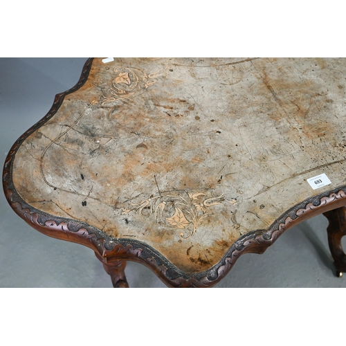 693 - A Victorian inlaid walnut centre table, the shaped and figured veneered top over turned and moulded ... 