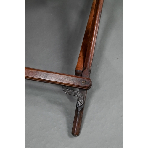 694 - An Afghan folding campaign chair, teak with steel mounts and a single spring action, fitted with a k... 