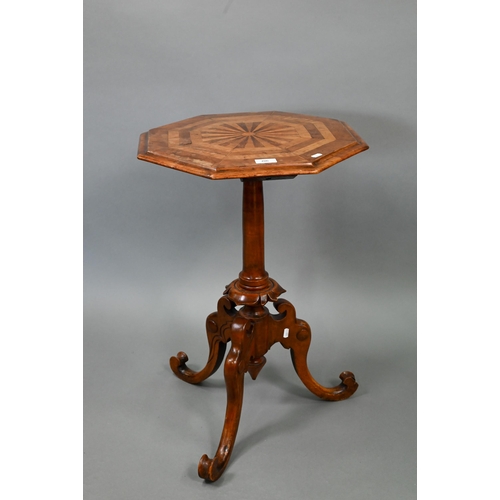 706 - A Victorian radially veneered octagonal top tripod table, 45 cm dia. x 69 cm h