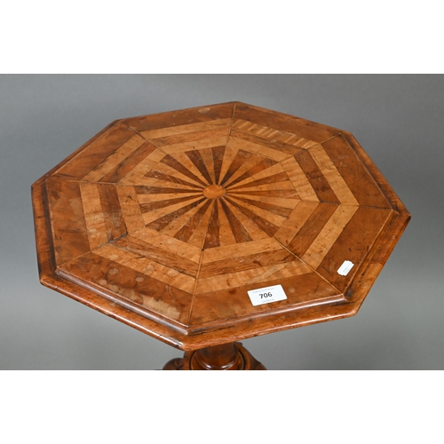 706 - A Victorian radially veneered octagonal top tripod table, 45 cm dia. x 69 cm h