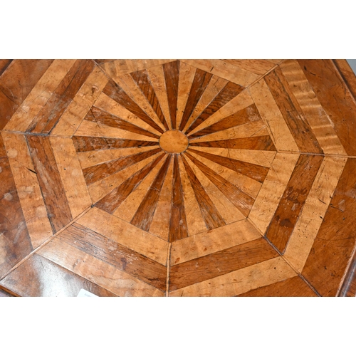 706 - A Victorian radially veneered octagonal top tripod table, 45 cm dia. x 69 cm h