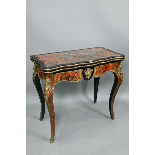 710 - A Louis XV Revival gilt metal mounted ebonised Boulle-work card table, raised on cabriole legs, 85 c... 