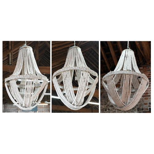 712 - A trio of large shabby-chic white washed strung wooden bead chandeliers, model 'Luna 2', approx. 72 ... 