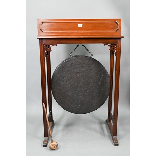 715 - An early 20th century Chippendale Revival walnut gong stand, with heavy patinated brass gong, to/wit... 