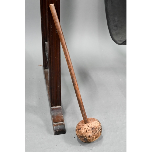 715 - An early 20th century Chippendale Revival walnut gong stand, with heavy patinated brass gong, to/wit... 