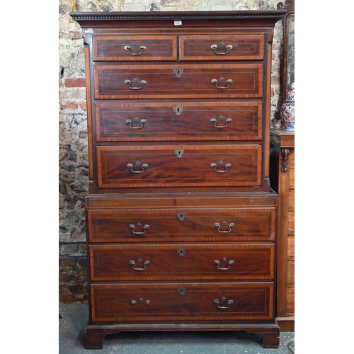 719 - A Victorian cross banded and inlaid bright mahogany chest on chest, the dentil moulded cornice over ... 