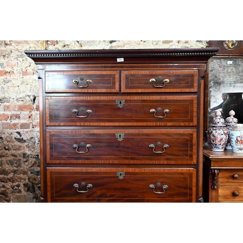 719 - A Victorian cross banded and inlaid bright mahogany chest on chest, the dentil moulded cornice over ... 