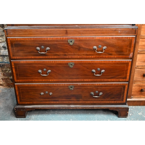 719 - A Victorian cross banded and inlaid bright mahogany chest on chest, the dentil moulded cornice over ... 