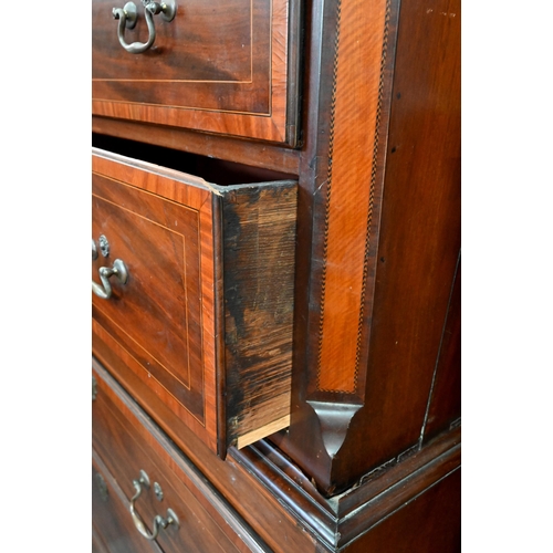 719 - A Victorian cross banded and inlaid bright mahogany chest on chest, the dentil moulded cornice over ... 