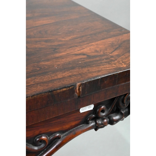 720 - A Regency rosewood card table, the fold over rotating top enclosing a blue baize lined surface, over... 