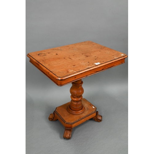 722 - A Victorian yew occasional table, the rectangular tilt top raised on a turned support to a platform ... 