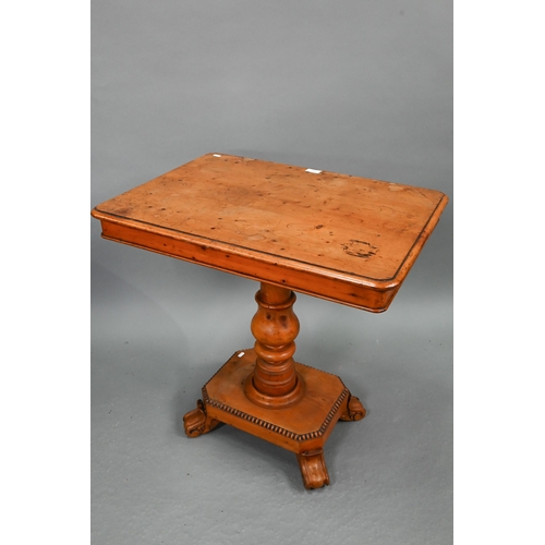 722 - A Victorian yew occasional table, the rectangular tilt top raised on a turned support to a platform ... 