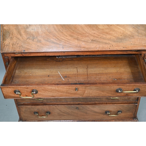 723 - A George III mahogany bureau, with part fitted interior over four long graduated drawers with brass ... 