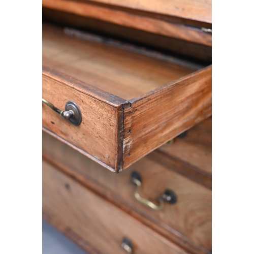 723 - A George III mahogany bureau, with part fitted interior over four long graduated drawers with brass ... 